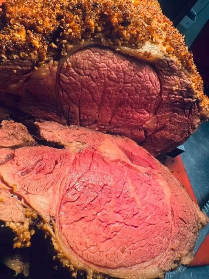 Thick slices of prime rib with a seasoned crust
